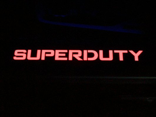 Ford Super Duty 99-16 Illuminated Door Sill Black Finish in Red Illumination