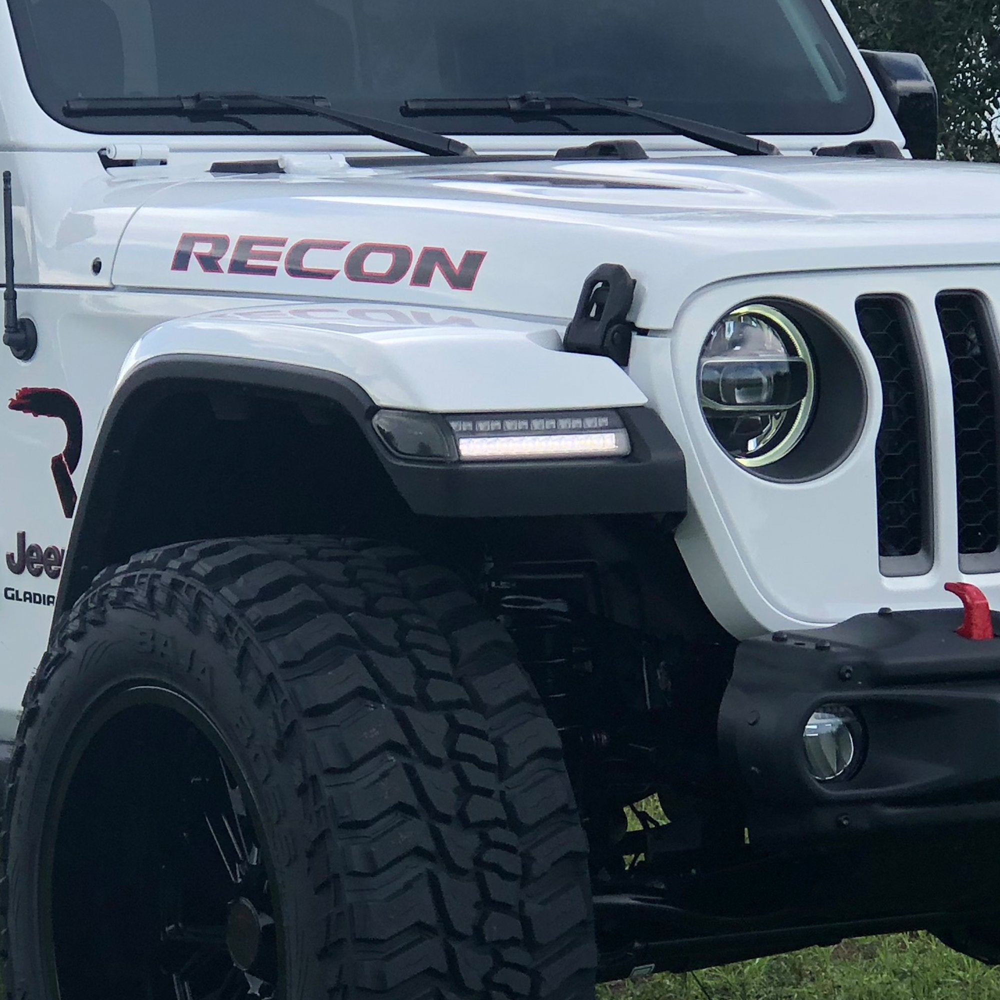 Jeep JL Wrangler / Gladiator 18-20 White OLED DRL with High Power Amber Scanning Switchback OLED Turn Signal 2-Piece Set Clear closeup 2