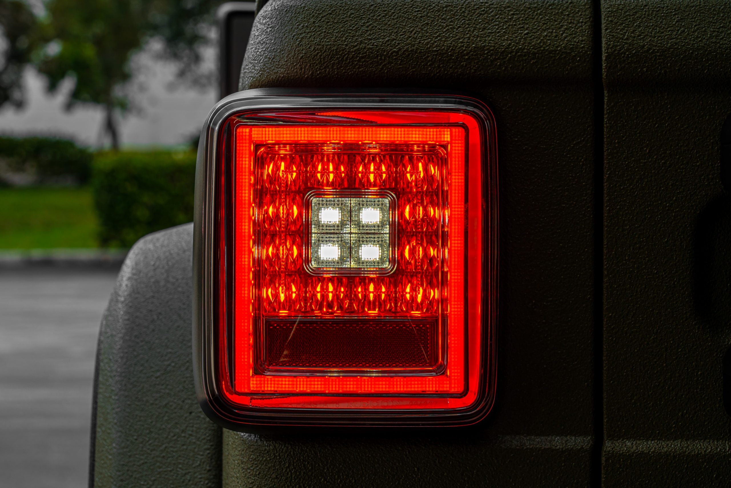 Lit photo of Jeep JL Wrangler 18-19 (for Factory OEM Halogen) Tail Lights OLED Smoked (dark)