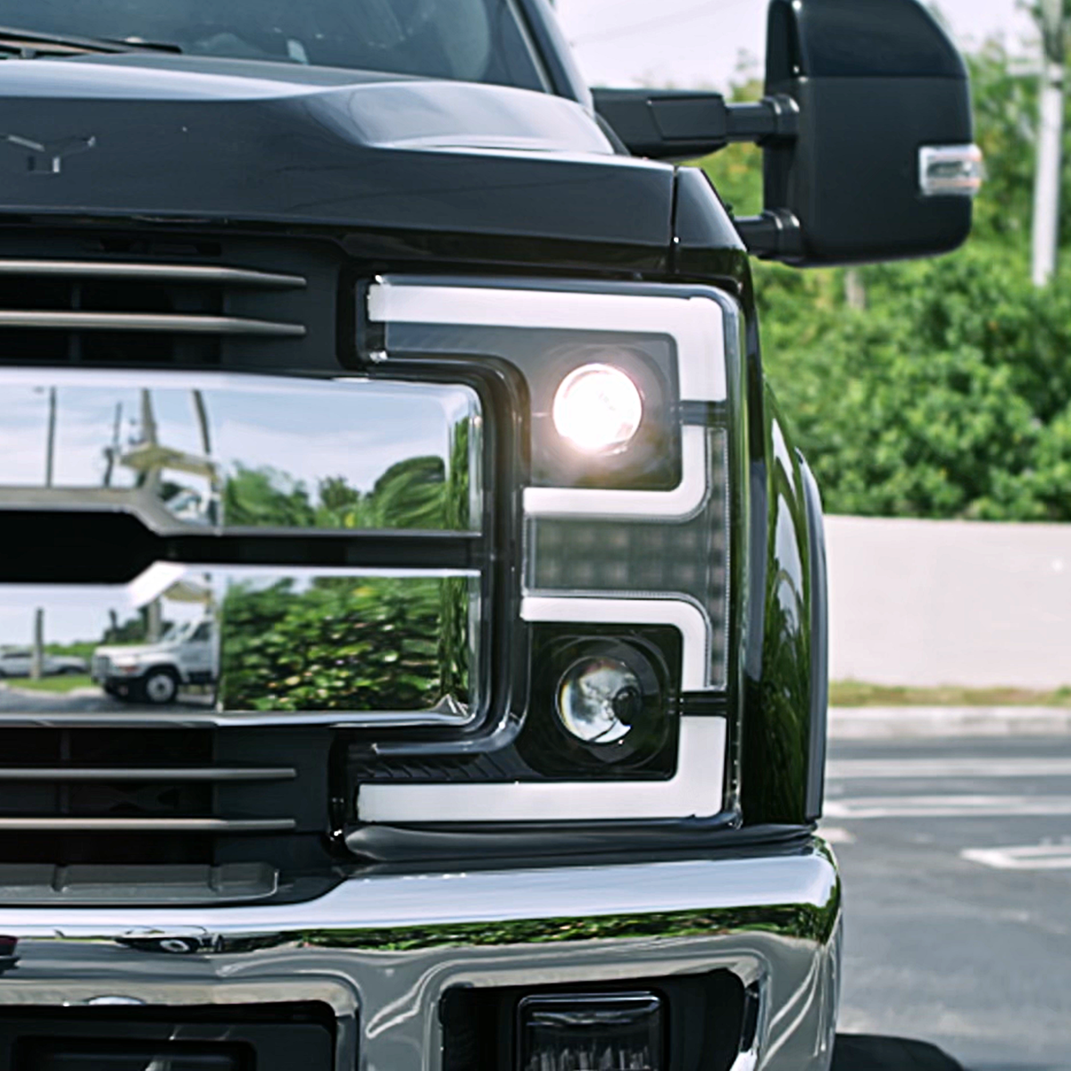 Ford Super Duty 17-19 Projector Headlights OLED DRL, LED Turn Signals Smoked closeup