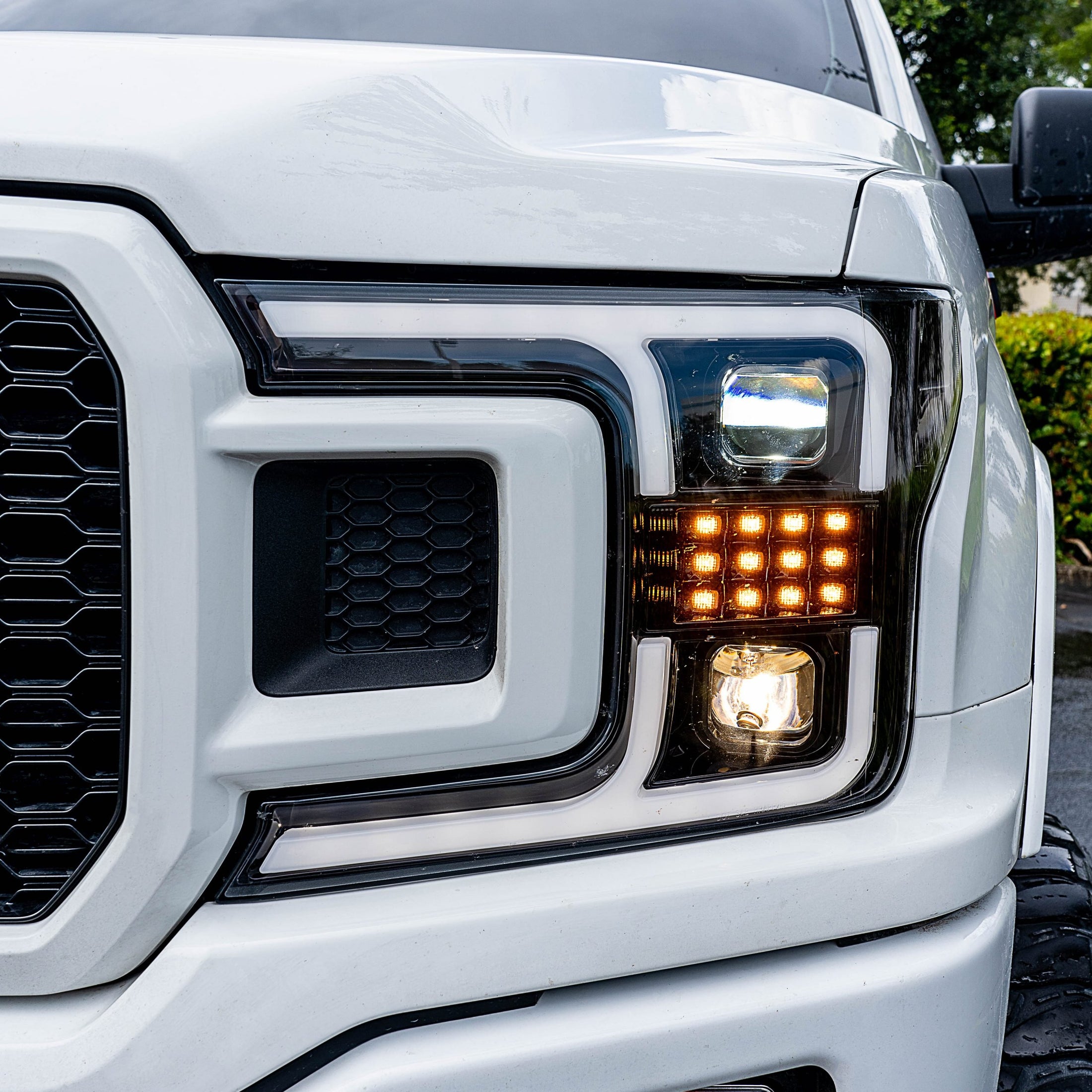 Ford F150 18-19 Projector Headlights OLED DRL, LED Turn Signals Smoked/Black closeup